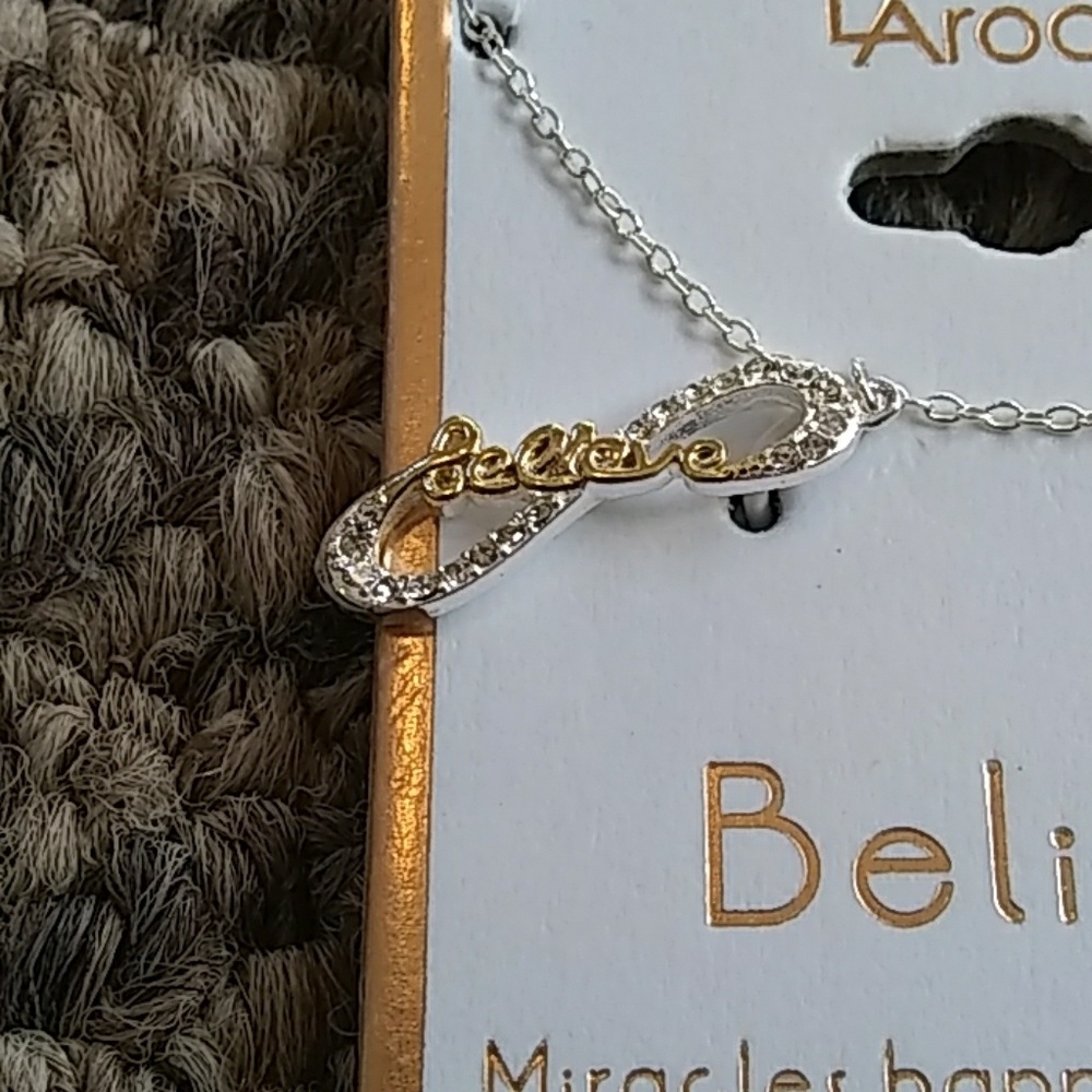 NWT Crystal and gold Believe necklace